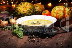 Pumpkin soup on a wooden table