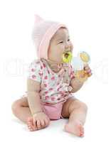 Asian baby girl teething