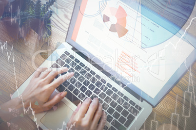 Hands of woman using laptop