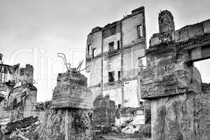 Pieces of Metal and Stone are Crumbling from Demolished Building