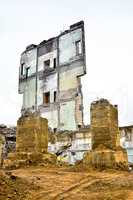 Pieces of Metal and Stone are Crumbling from Demolished Building