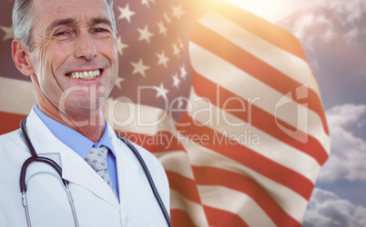 Composite image of portrait of male doctor smiling