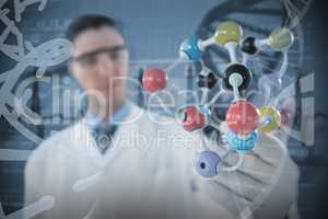 Composite image of scientist experimenting molecule structure 3D