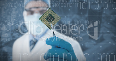 Composite image of doctor holding electronic chip with forceps