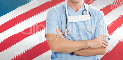 Composite image of portrait of doctor standing with arms crossed