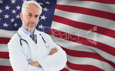 Composite image of portrait of a serious confident male doctor at medical office