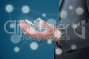 Composite image of midsection of businessman holding invisible object against white background 3D