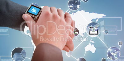 Composite image of businessman checking his smart watch 3D