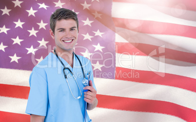 Composite image of portrait of smiling doctor holding clipboard