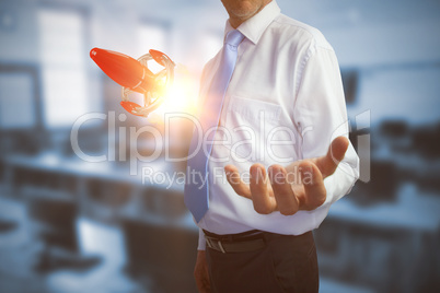 Composite image of businessman holding hand out 3D