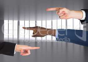 Composite image of Hands Pointing Blame accusation against windows as background