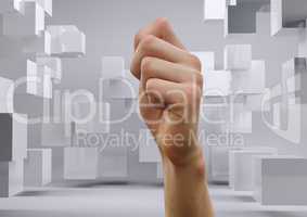 Composite image of fist against futuristic white cubes