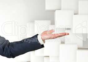 Composite image of businessman Open hand against white cubes