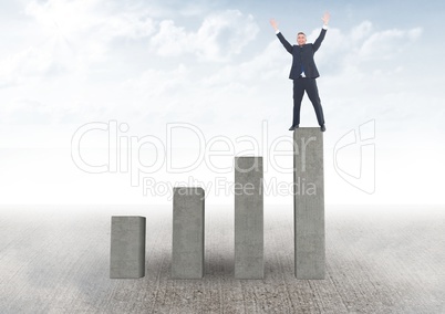 Composite image of Businessman standing on graph post raising his arms against sky