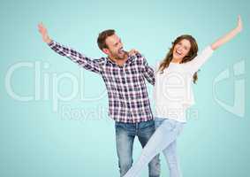 Happy Couple Having Fun against a blue Background