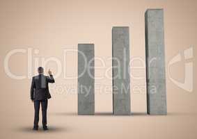 Composite image of Business man Standing looking at Graph against neutral background