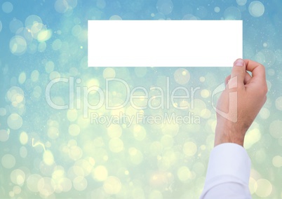 Composite image of Hand Holding white board against bright blue background