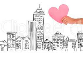 Composite image of Hand holding Heart against city drawing
