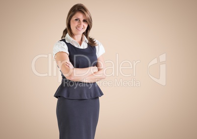 Happy Businesswoman smiling at camera against a neutral background