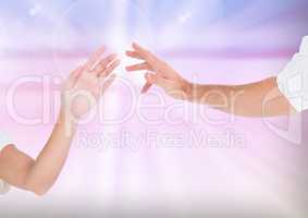Composite Image of two Hands holding with Kindness against a light background