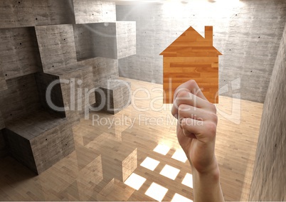 Composite image of Hand Holding Wood Home House in a wood room background