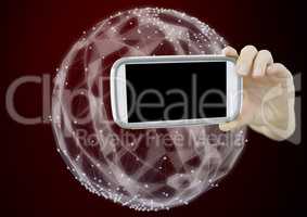Composite image of Hand holding cell Phone against Sphere Polygons