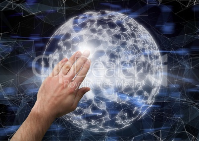 Composite image of Hand touching bright globe against graphic effects