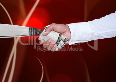 Composite image of Handshake between robot and human against red background