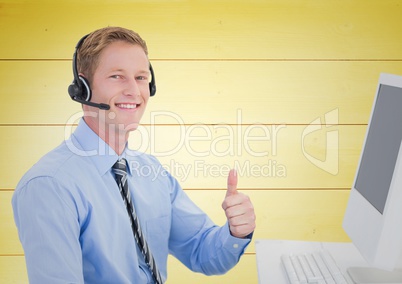 Happy Travel agent with headset against a yellow background