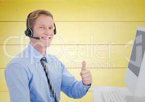Happy Travel agent with headset against a yellow background