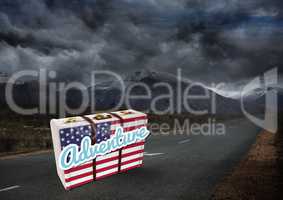 American Flag Luggage against dark moutain background
