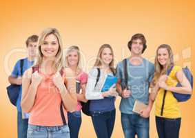 Students Smiling at camera against an orange background