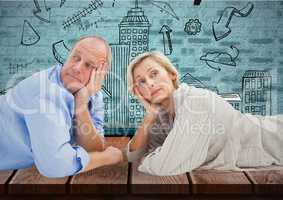 Composite image of Mature couple against a wall with sketches