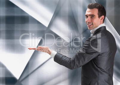 Composit eimage of man with open hand against modern grey background