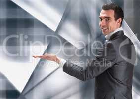 Composit eimage of man with open hand against modern grey background