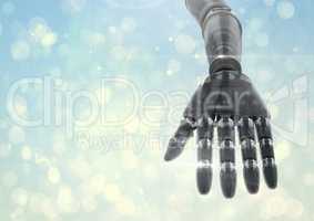 Composite image of robot hand against bright blue background