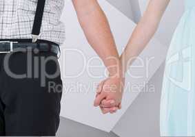 Composite image of couple holding hands against graphic grey background