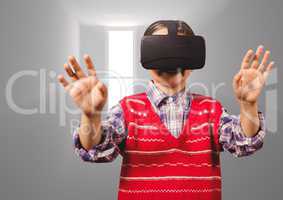 Composite image of Kid wearing black helmet against empty room