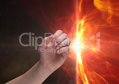 Composite image of Hand against Flames