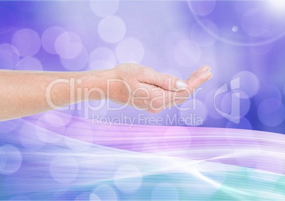 Composite image of open Hand against purple bright background