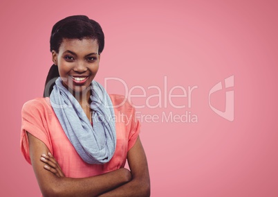 Happy Woman smiling at camera against a pink Background