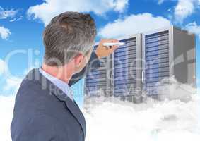 Composite image of Businessman drawing folders against blue sky