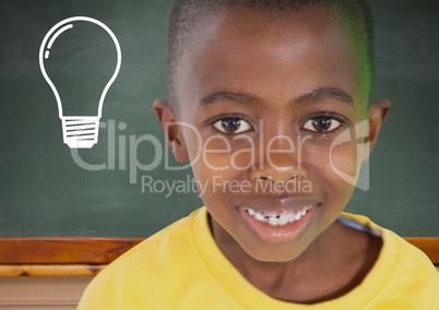 Composite image of kid smiling against blackboard with lightbulb