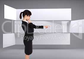 Businesswoman Hand pointing against a grey background