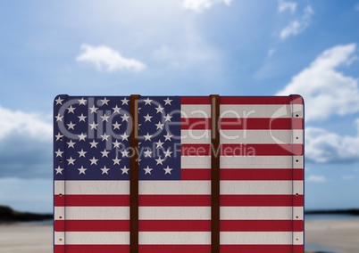American Flag Luggage against sky background