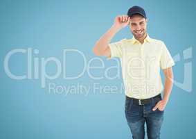 Happy Man holding his hat against blue background