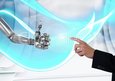 Composite image of Human hand showing a robotic hand against an interface with grey background