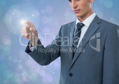 Composite image of Hand pointing light against bright blue background