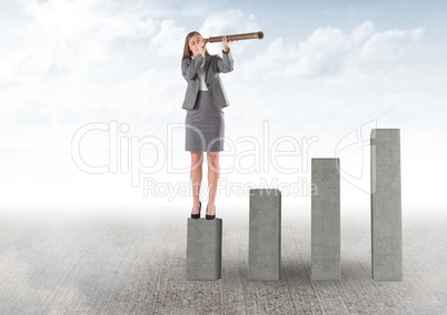 Business woman on a graph looking her objectives against sky background