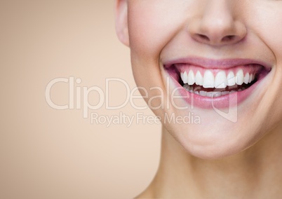 Composite image of a woman smile against beige background